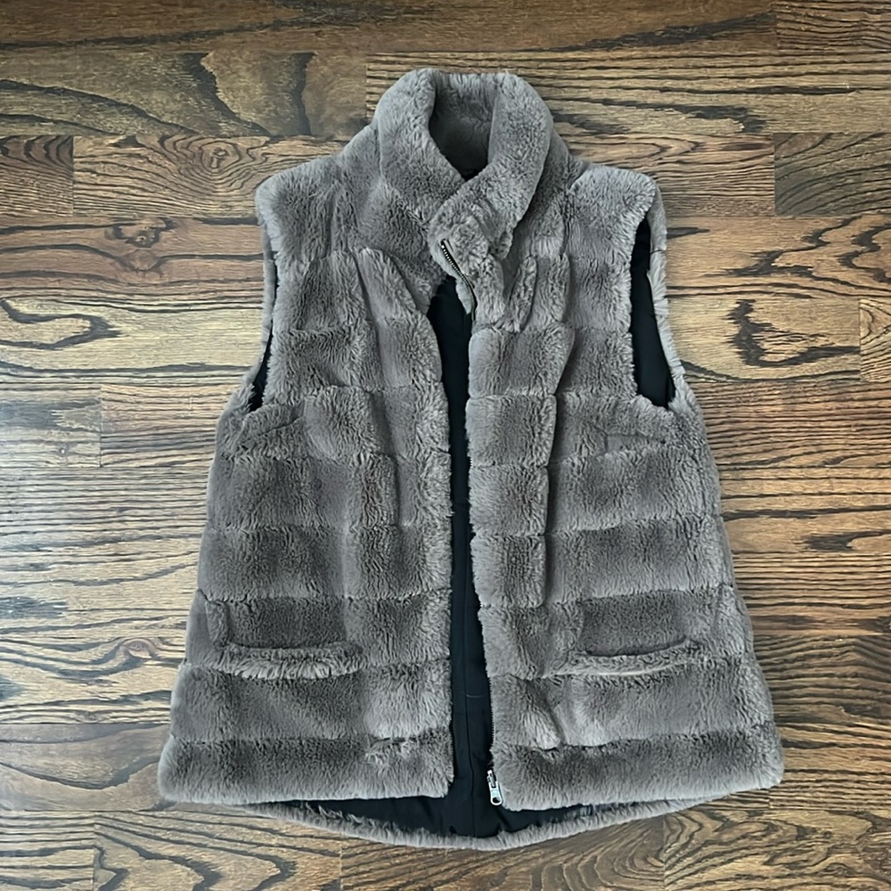 Reversible vest. Incredibly soft!!! Pockets and zipper. Worn once.